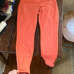 Lululemon orange workout leggings size 10